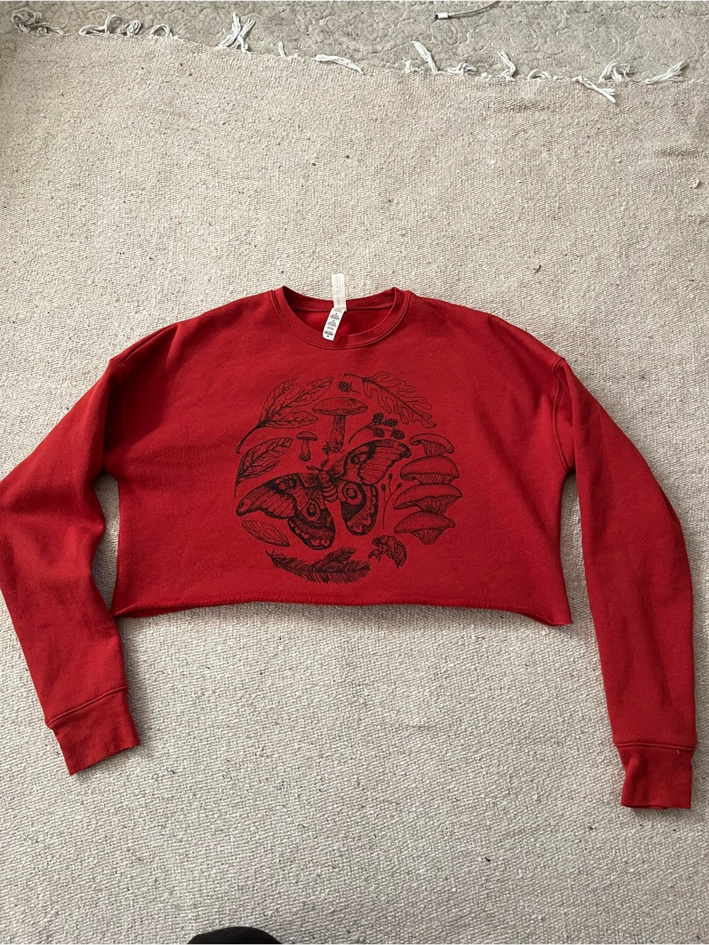 Bella Canvas Red Cropped Crewneck Sweatshirt with Black Nature Graphic